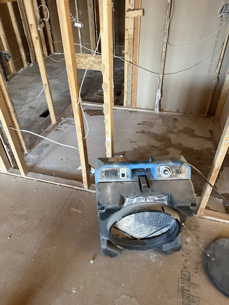 image of water damage restoration - fan drying damaged area