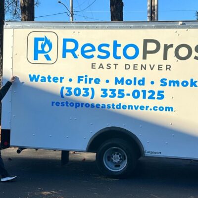 Andy Bell standing in front of resto pros truck