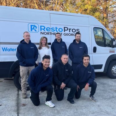 RestoPros of Northeast Georgia team standing infront of a RestoPros truck