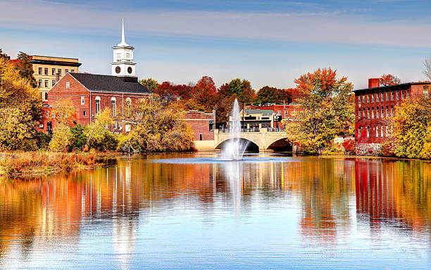 lake overlooking city in fall