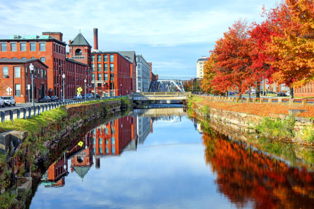 river overlooking a city in the fall