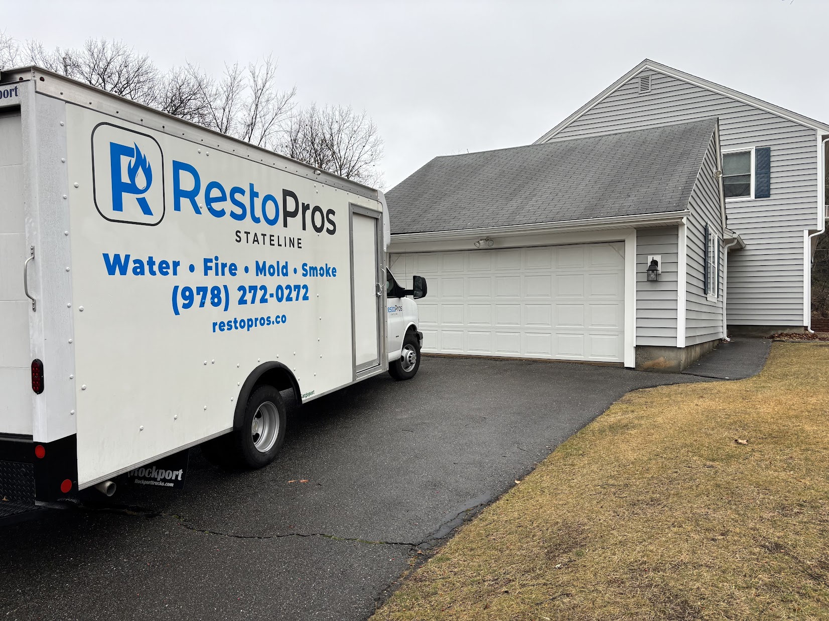 restopros truck outside of house