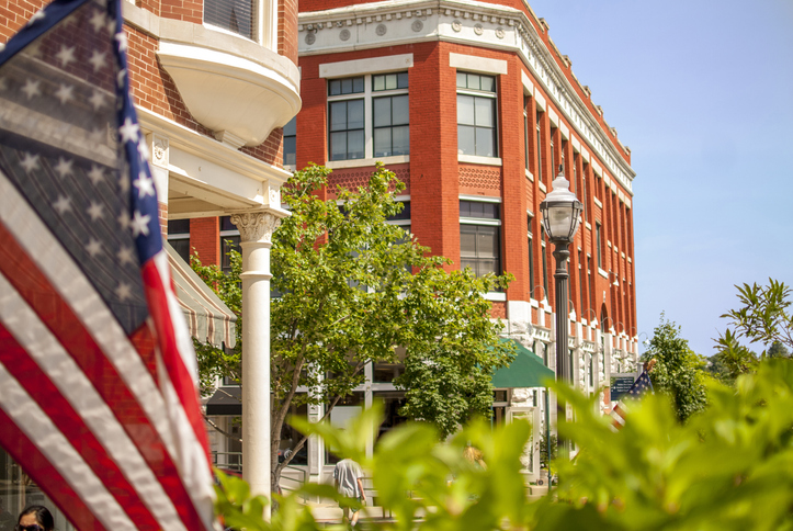 American flag flying on the downtown Fayetteville square.