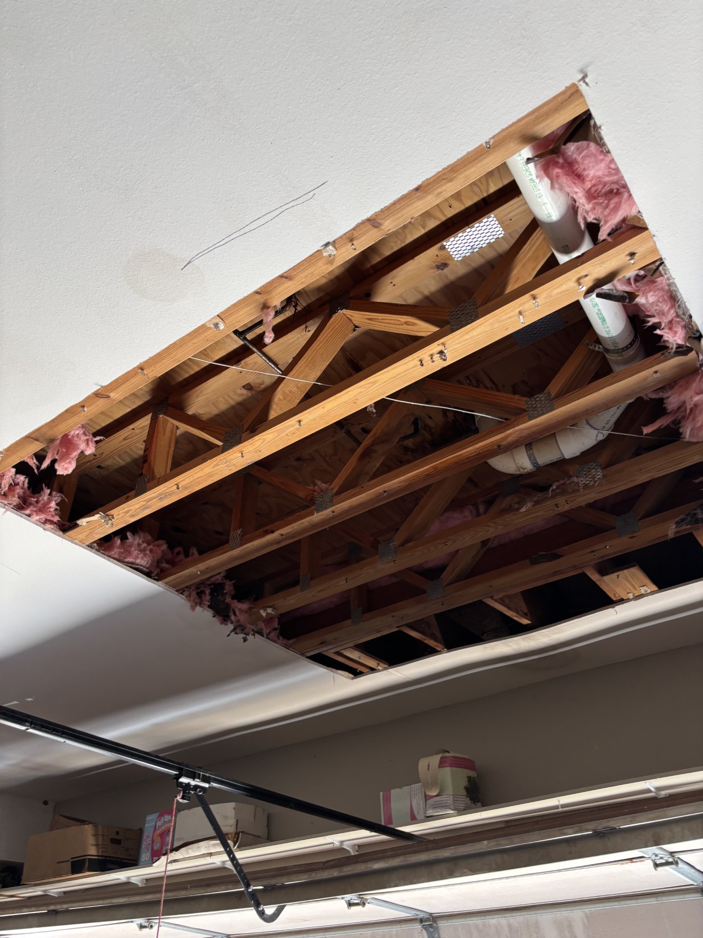 photo of ceiling and cut out into attic