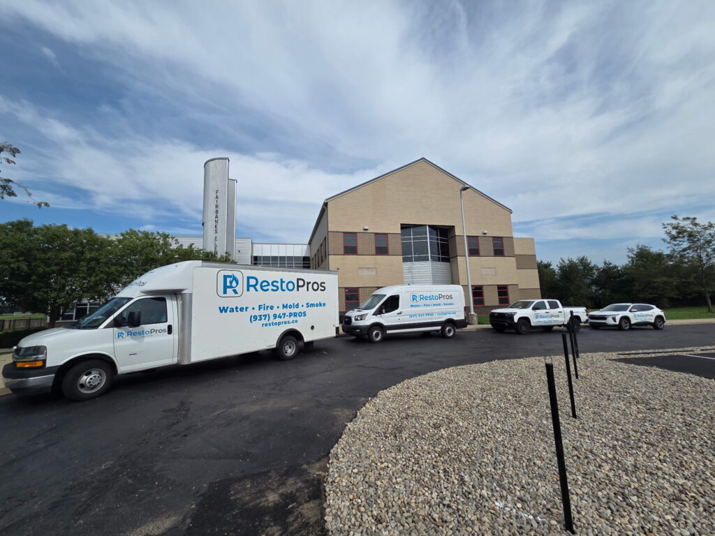 trucks in front of building