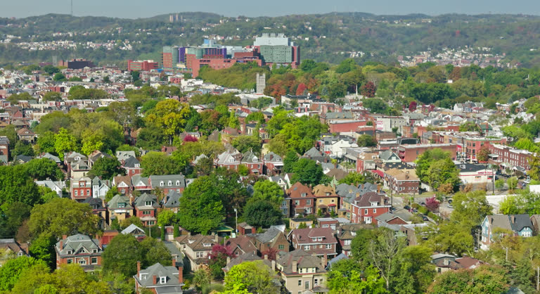 Aerial shot of Friendship, a neighborhood in the East End of Pittsburgh, Pennsylvania, on a sunny morning in Fall.