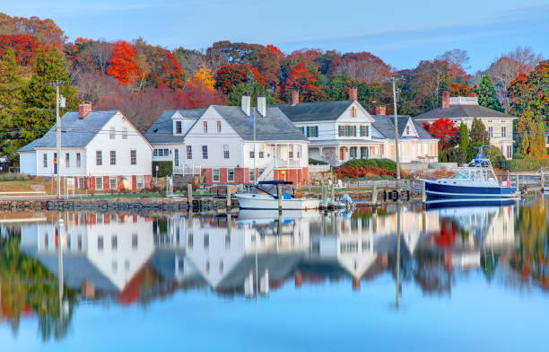 Groton, Connecticut houses on the water with autumn trees