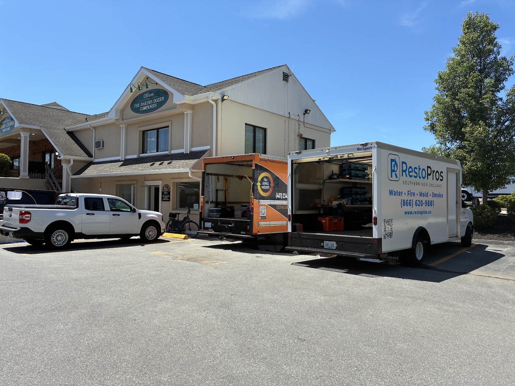 Restopros truck in front of a New England Home