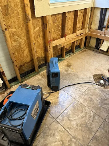 Fans on the floor for water damage restoration