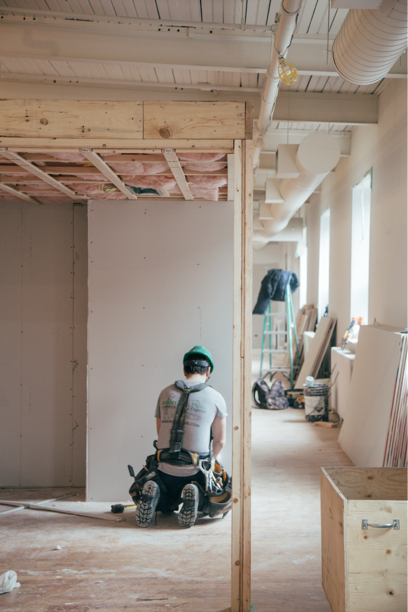 Restoration technician working on home restoration