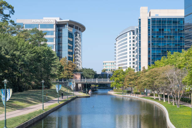 The Woodlands, Texas, USA. October 14, 2022. A river winding its way through the business district of an urban community.