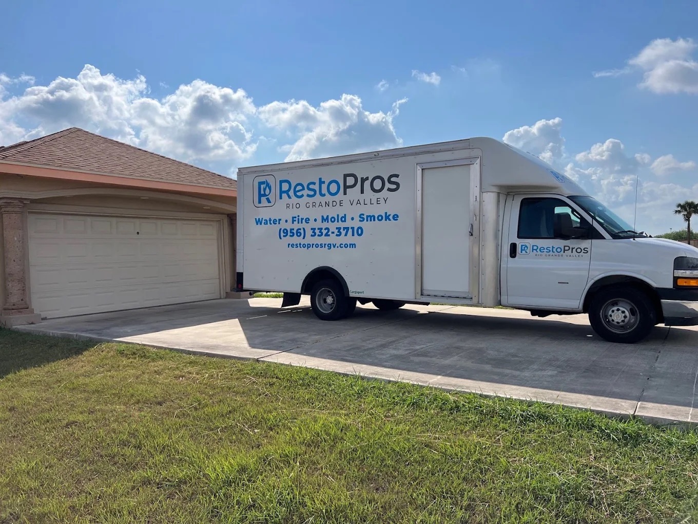 RestoPros of Rio Grande Valley van in front of a house