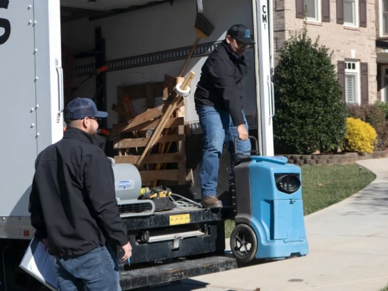 RestoPros workers in a truck