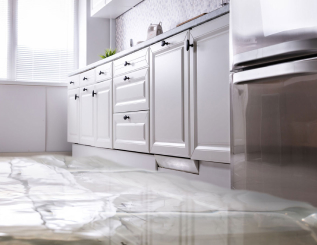 water on floor in kitchen