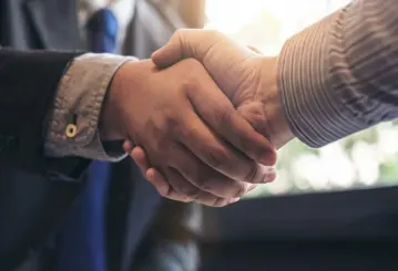 image of a handshake up close