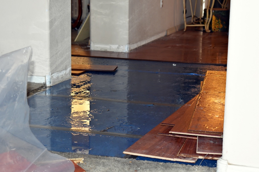a room in the home is flooded with water from a broken water heater