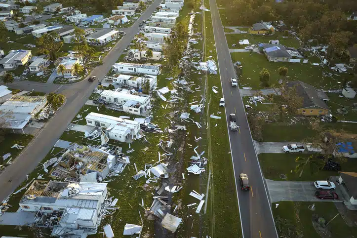 Destroyed by hurricane Ian suburban houses in Florida mobile home residential area. Consequences of natural disaster.
