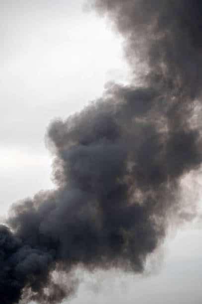 dark-black-smoke-rising-into-the-sky
